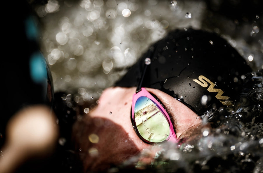 SWANS swim goggles with pink frame and Ruby Mirrored lenses